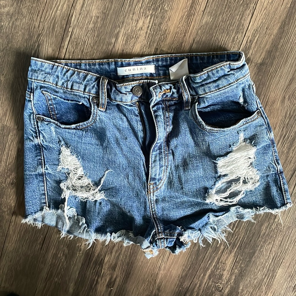 Eunina brand, size “M” (4-6) high rise Jean shorts. Like new!